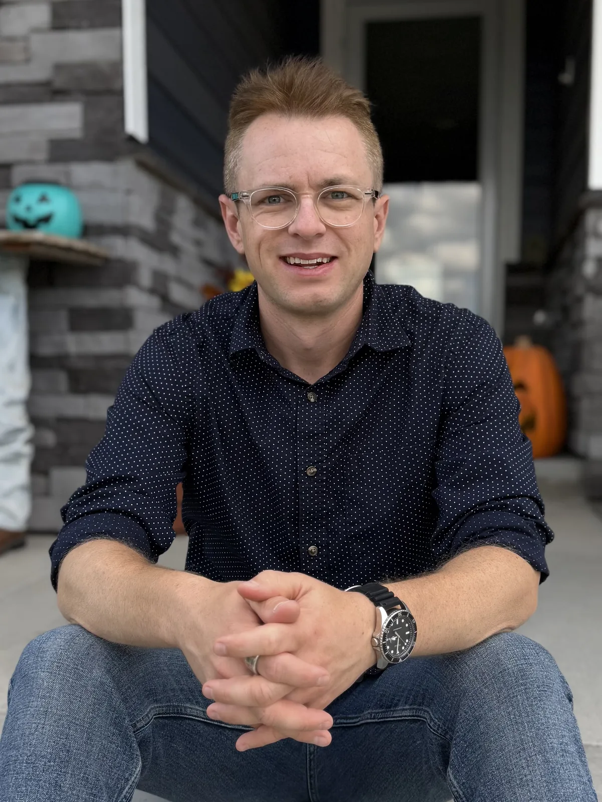 Seth Drehle-Ewan, author of this Ramsay Hunt Syndrome field guide, sitting on his front steps in Timnath, Colorado